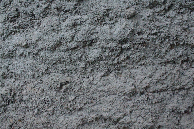 Betonowa ściana Jasnoszarego Koloru Cementowego Tła