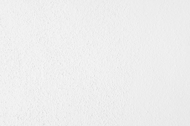Bezszwowa tekstura białej ściany cementowej szorstkiej powierzchni z miejscem na tekst dla backgroundx9