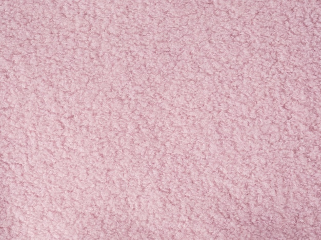 Biała dzianina różowa wełna tekstura tło.