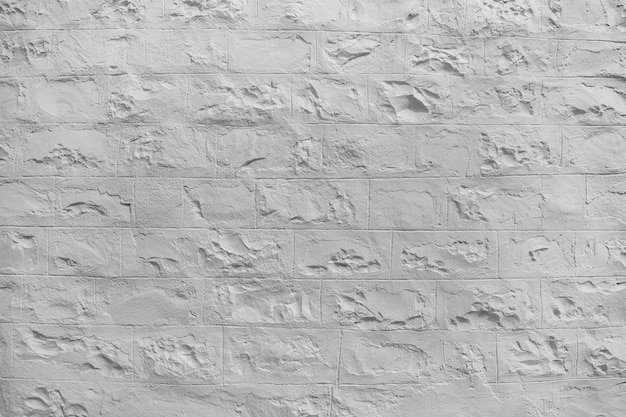 Zdjęcie biała malowana szorstka kamienna ściana tekstury