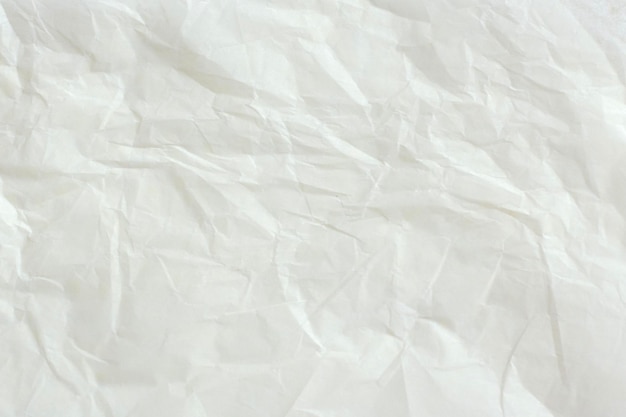 Białe opakowanie z kości słoniowej, zmarszczony papier, tekstura tła