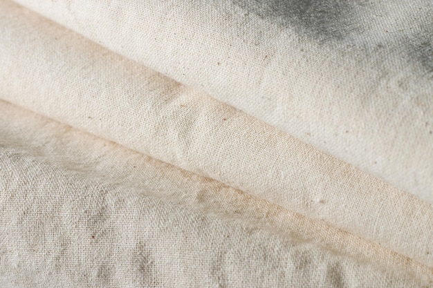 Białej perkalowej tkaniny tła sukienna tekstura