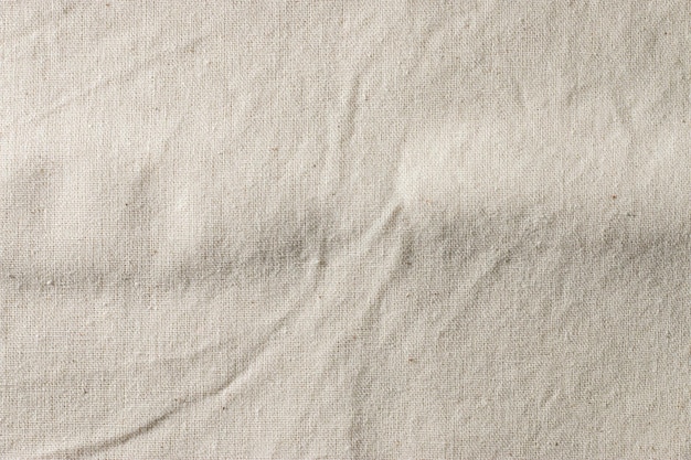 Białej perkalowej tkaniny tła sukienna tekstura