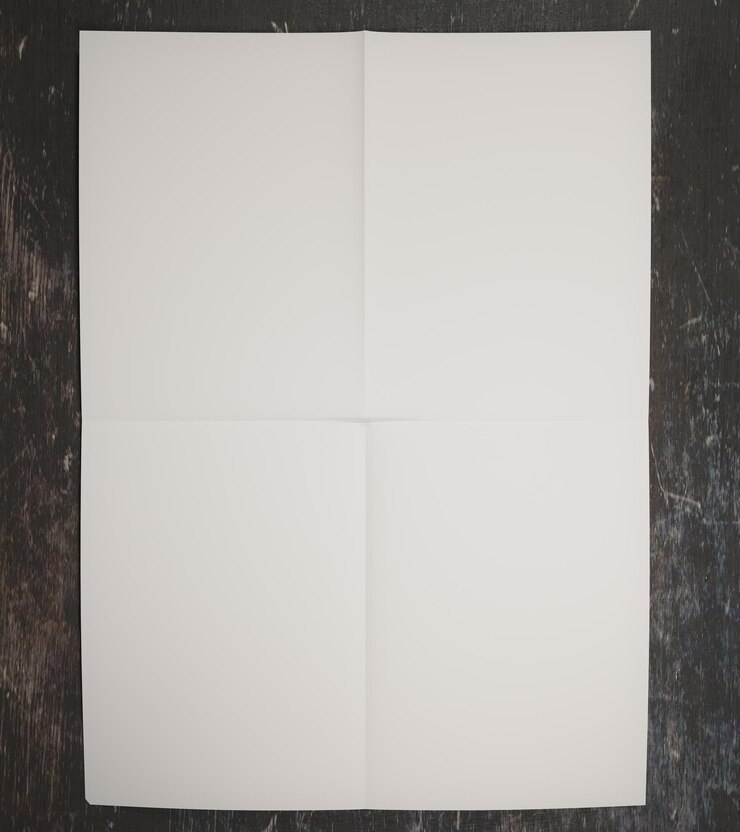 Zdjęcie biały papier na powierzchni betonu