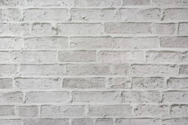 Biały ściana z cegieł wietrzejąca tekstura dla tła