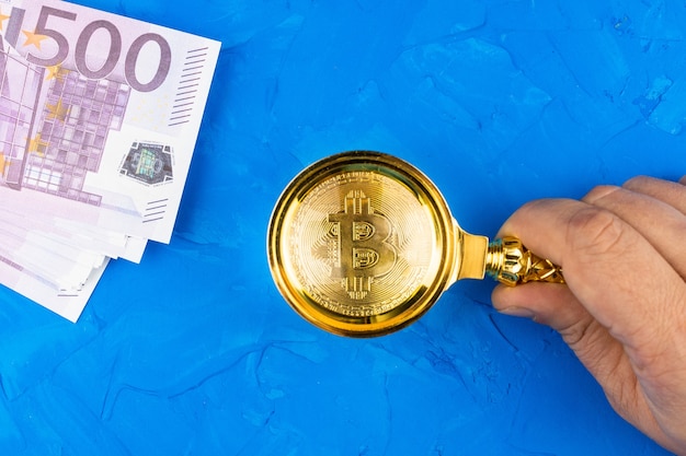 Bitcoin euro na błękitnym tle