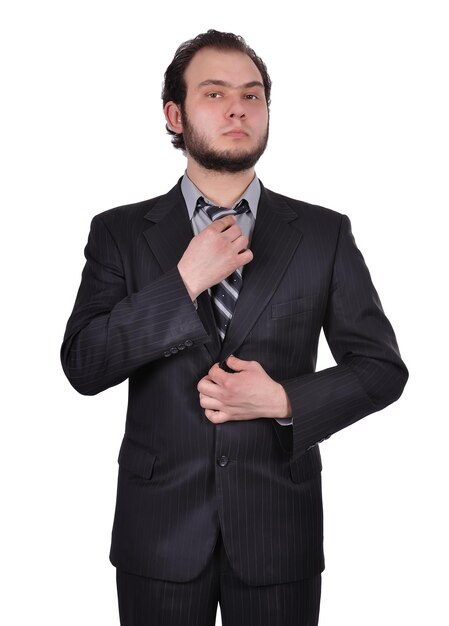 Biznesmen dostosowuje jego krawat