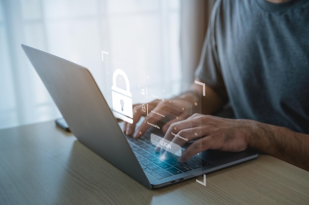 Zdjęcie biznesmen klucz hasło do logowania laptop do dostępu do informacji bezpieczeństwo i szyfrowanie bezpieczny dostęp do danych osobowych użytkownika dostęp do internetu cyberbezpieczeństwo koncepcja technologii cyberbezpieczeństwa