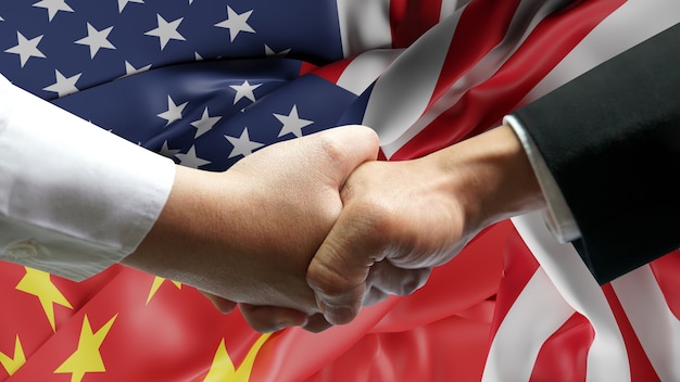 Biznesmen potrząśnij ręką nad Chinami i amerykańską flagą.