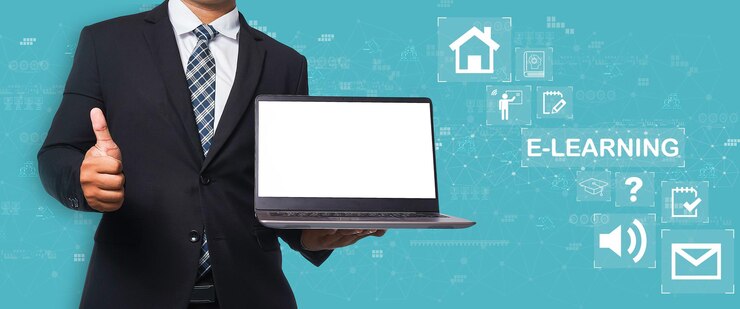 Biznesmen w czarnym garniturze, trzymając laptopa i kciuki w górę wirtualny ekran na niebieskim tle e-learning edukacja Internet technologia Webinar Online Courses concept
