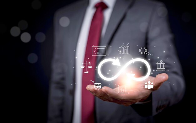 Biznesmeni trzymają symbol nieskończoności z technologią globalny marketing online w połączeniu biznesowym strategia gospodarki sieciowej bankowości inwestycyjnej i wymiany danych finansowych dla wzrostu biznesu