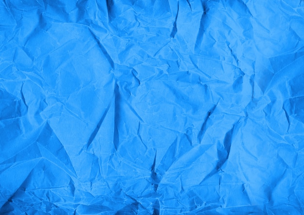 Błękitny zmięty papierowy tekstury tło