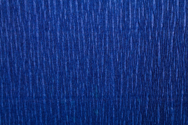 Zdjęcie bliska niebieskie stonowane tło tekstury papieru krepowego