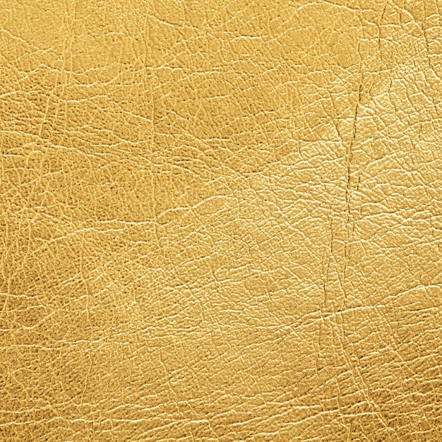 Zdjęcie bliska strzał złotej skóry tekstury tła