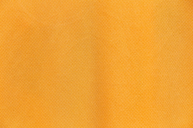 Bliska żółte tło tkaniny tkaniny i tekstury.