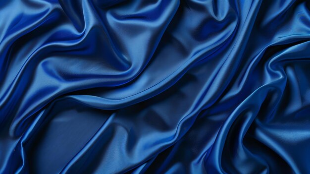 Zdjęcie blue silk fabric with soft waves abstract background of blue silk