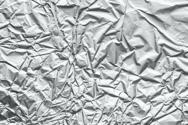 Błyszczące srebrno-szare metalowe folie zmięty tekstura tło