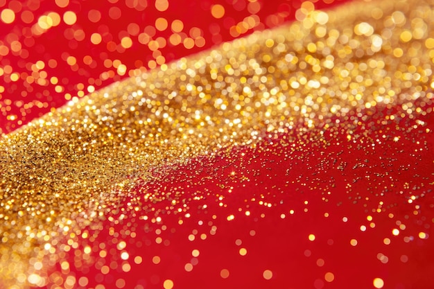 Zdjęcie błyszczące złote cząstki w czerwonym płynie tworzą abstrakcyjne wzory