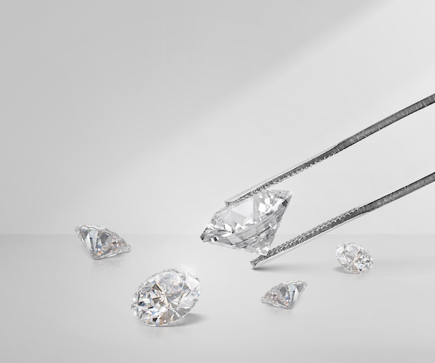 Zdjęcie błyszczący genialny diament w diamentowych pincetach i okrągłym diamentie z odbiciem