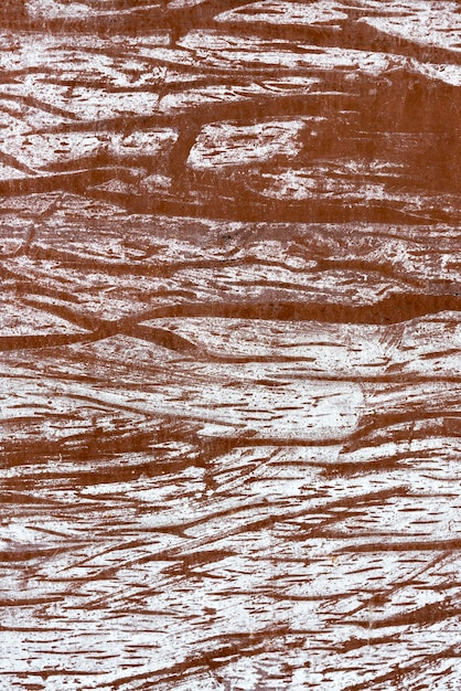 Zdjęcie brązowe drewniane tło z białą farbą