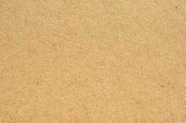 Brązowy eko makulaturowy papier pakowy tekstura tło kartonowe