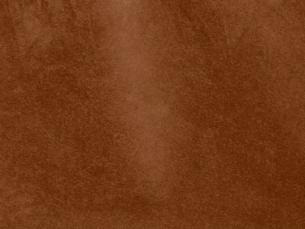 Zdjęcie brązowy kolor tekstury tkaniny aksamitu używane jako tło puste brązowe tkaniny tła z miękkich i gładkich materiałów włókienniczych jest miejsce na tekst