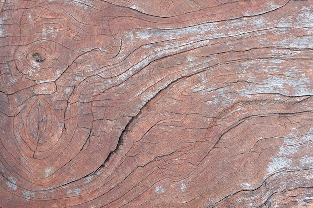Brązowy stary drewniany tło pęknięty wzór