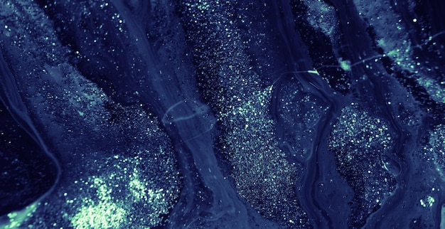 Zdjęcie brokatowy płynny mokry atrament tekstury niebieska farba