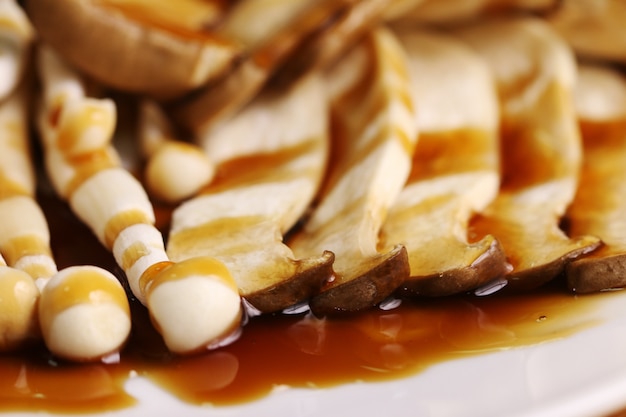 Brown Mushroom on dish with sauce