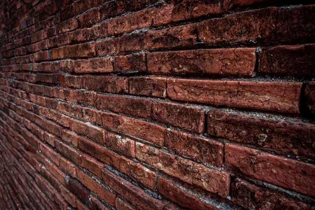 Zdjęcie brown ściana z cegieł tekstury grunge tło z winieta kątami