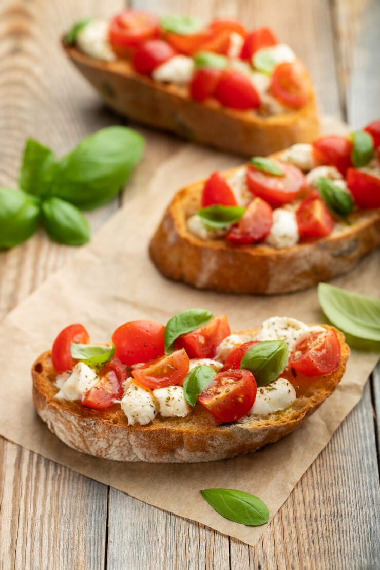 Zdjęcie bruschetta z pomidorami, serem mozzarella.