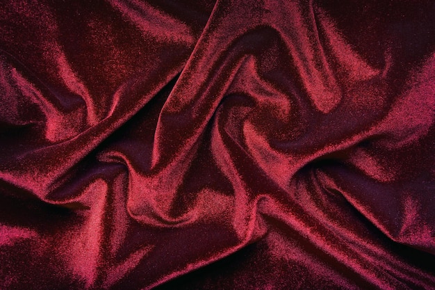 Burgundowa aksamitna tkanina jako tło