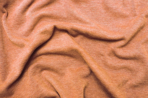 Zdjęcie burgundy peach fuzz zmarszczony pluszowa tkanina tła tekstura miękkiego materiału wzór kolor roku 2024