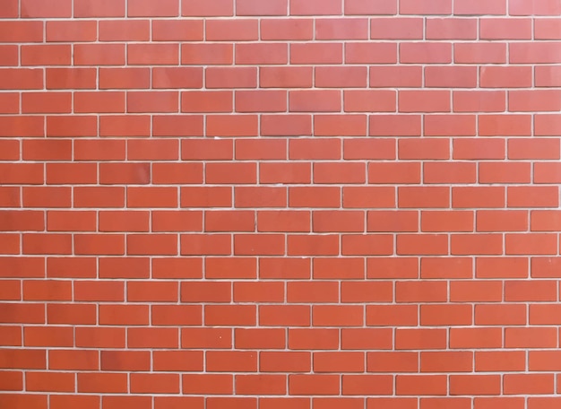 ceglana ściana z czerwonym ceglanym tłem