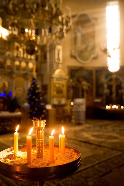 Zdjęcie cerkiew świece świątynia, religia podróż kultura, złote światło