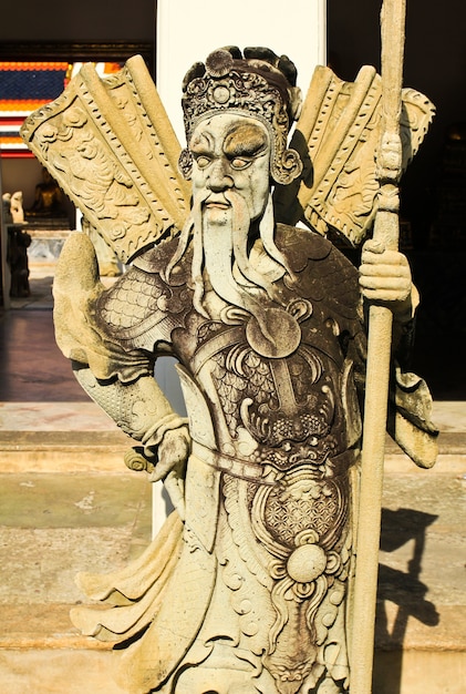 Chińska statua przy wata pho świątynią, Bangkok, Thailand