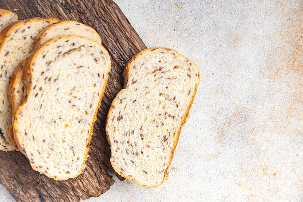 Zdjęcie chleb nasiona lnu produkt piekarniczy zdrowy posiłek jedzenie dieta przekąska na stole kopia przestrzeń jedzenie