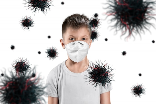 Chłopiec dziecko w masce chroni się przed cząsteczkami wirusa latającymi w powietrzu