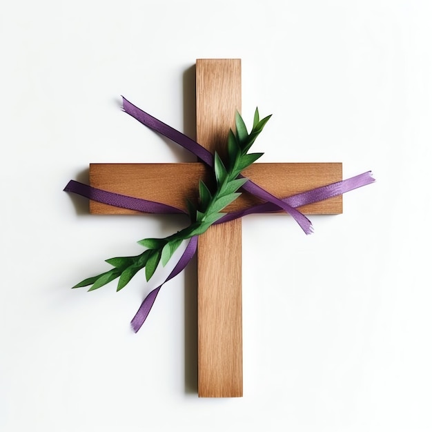 Chrześcijański drewniany krzyż krzyżowy z zielonymi liśćmi palmowymi jako święto religijne