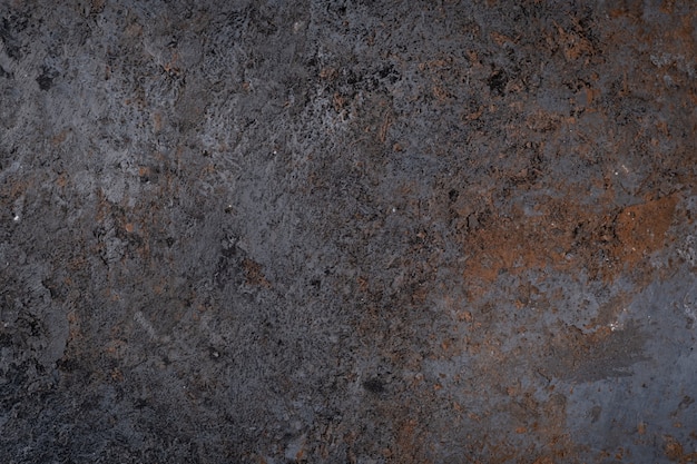 Zdjęcie ciemna tekstura powierzchni starego kamienia, grunge ściany lub podłogi