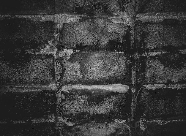 Ciemnoszare czarne tło lub tekstura ceglana ściana teksturyasortyment starych cegieł w budownictwie