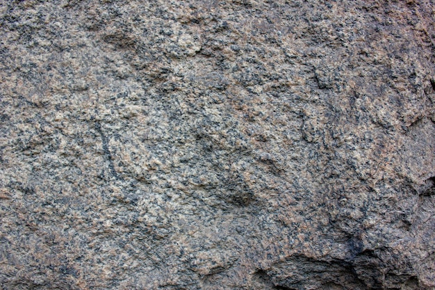 Ciemny autentyczny granitgranitowy kamieńteksturaprojektgranitowa fasadaszorstka powierzchniaszczegóły tła