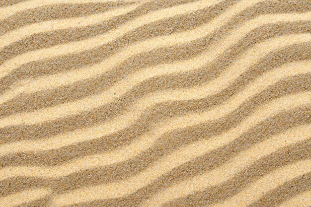 Cudowne piaskowe tło z fascynującym motywem
