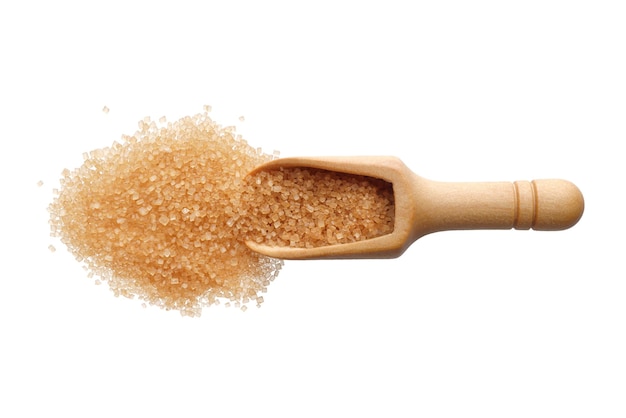 Cukier trzcinowy w drewnianej łyżce