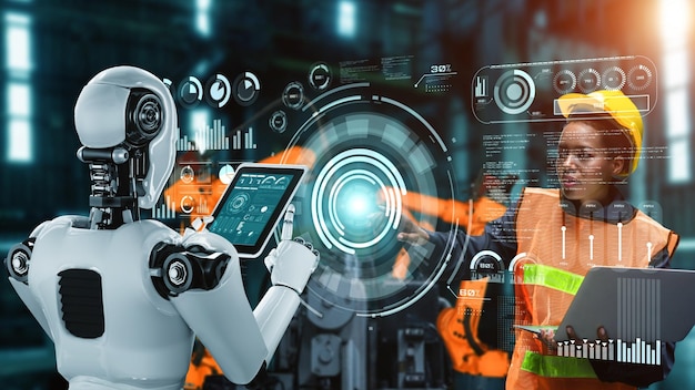 Cybernatyczny robot przemysłowy i ludzki pracownik współpracujący w przyszłej fabryce