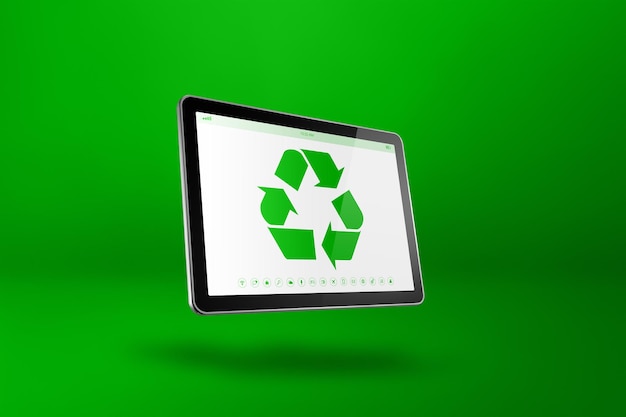 Cyfrowy tablet PC z symbolem recyklingu na ekranie koncepcji ochrony środowiska