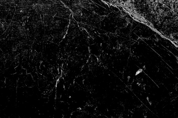 Zdjęcie czarna marmurowa tekstura z białym tłem