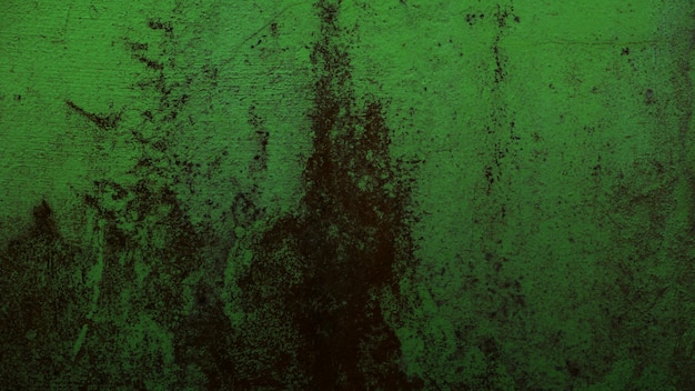 Czarna plama zielone tło ściany