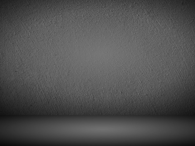 Zdjęcie czarna ściana gradientowa. pusty pokój typu studio. zwykłe tło studyjne
