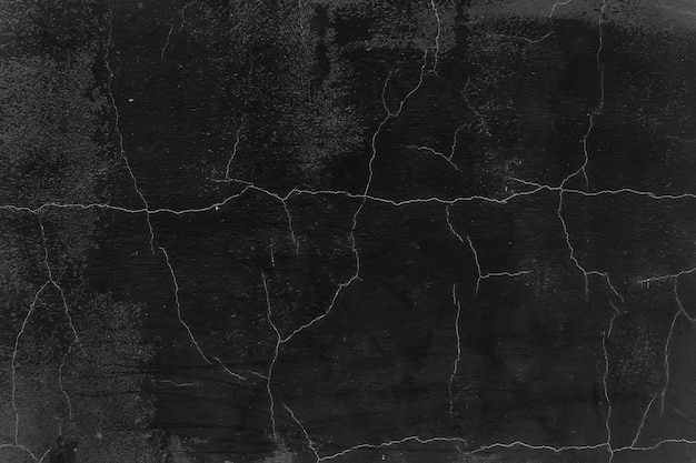 czarna stara ściana popękana betonowe tło / abstrakcyjna czarna tekstura, vintage stare tło